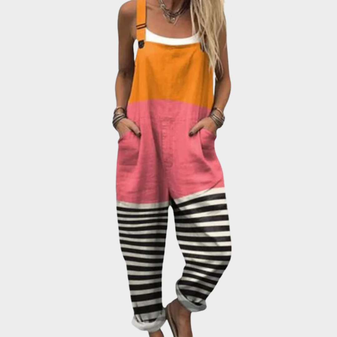 Loose printed overalls with orange and pink bib and black-and-white striped legs