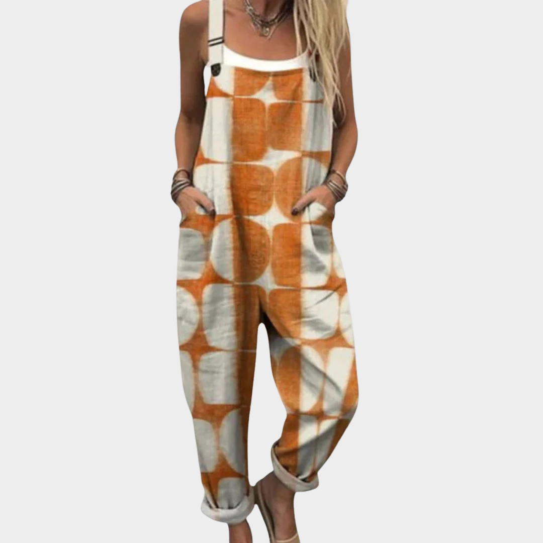Printed loose overalls with orange-and-white abstract pattern, adjustable straps, pockets