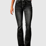 High-waisted slim-fit black jeans with button fly, belt loops, five pockets