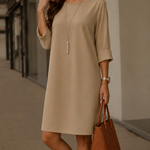 Beige midi shift dress with 3/4 sleeves and round neckline