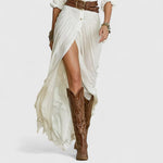 White long linen wrap dress detail: draped front, gathered waist, and side slit
