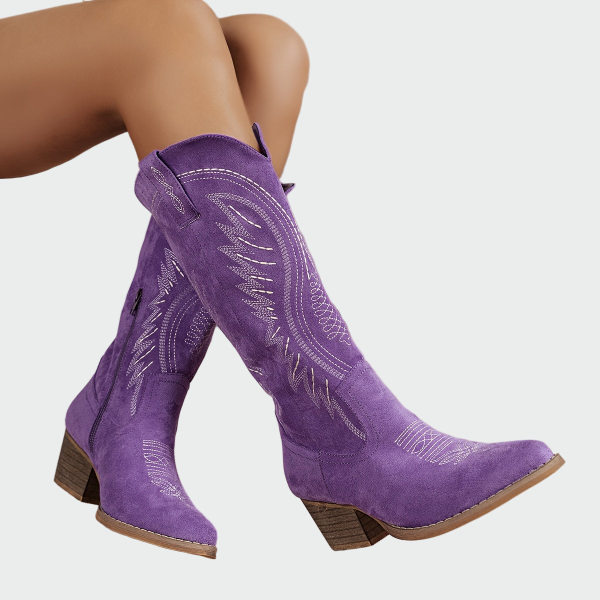 Purple suede mid-calf western boots with decorative stitched embroidery and block heel
