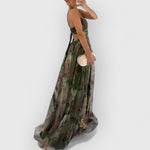 Green maxi dress side view with spaghetti straps and multicolor floral print