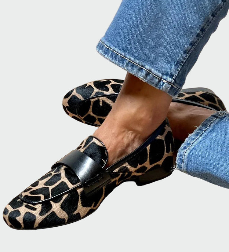 Leopard-print loafers with black strap detail