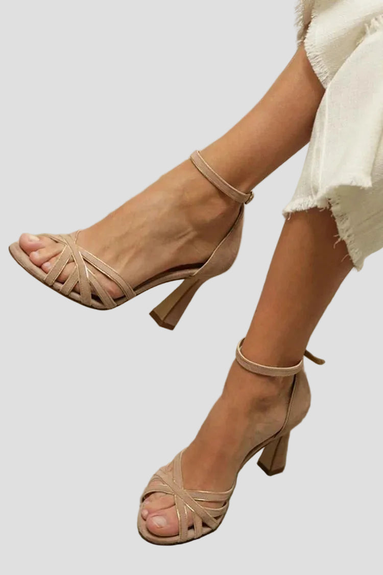 Light brown high-heel sandal with thin heel and ankle strap, open toe