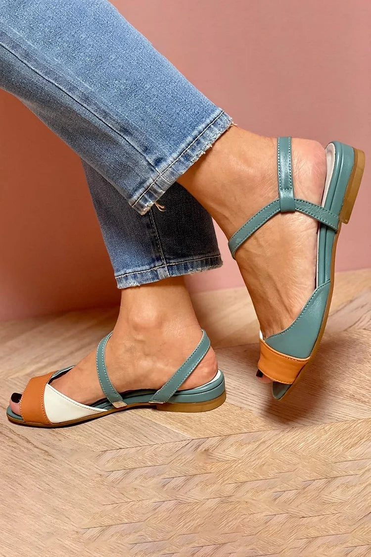 Teal ankle-strap sandals with open toe, orange heel detail, and adjustable straps