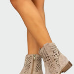 Tan suede ankle boots with perforated design and side zipper, block heel