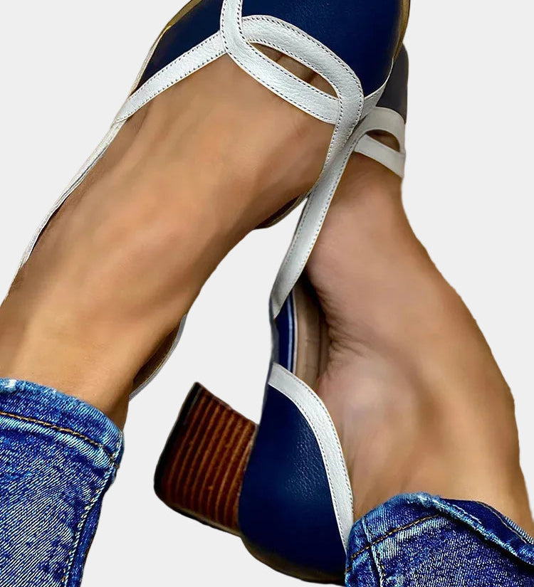 Navy open-toe sandals with white crisscross straps