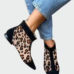 Leopard-print ankle boots with pointed toe and black trim