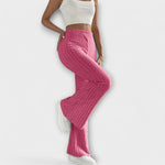 Raspberry pink ribbed knit flare pants with high waist and wide bell leg