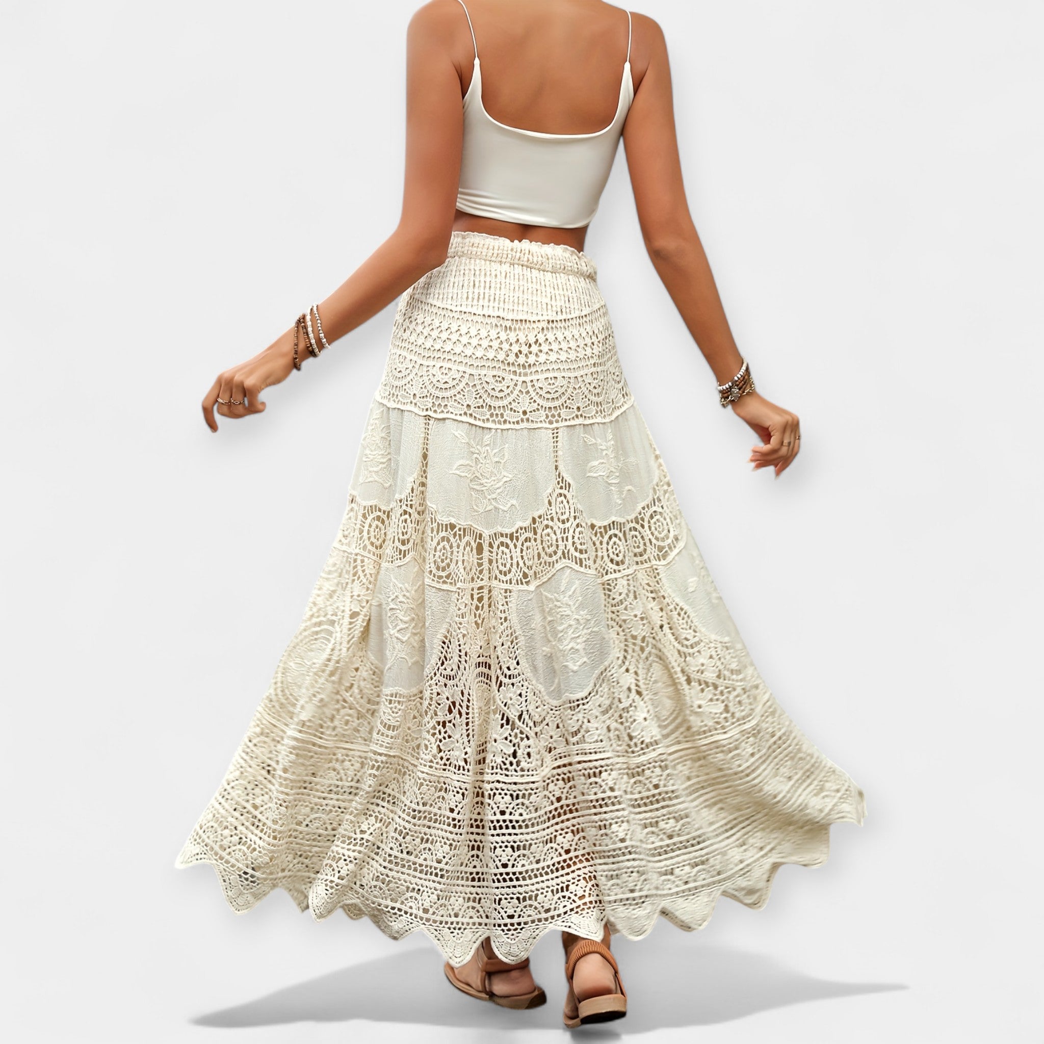 Cream tiered lace midi skirt with smocked waist and full flared shape