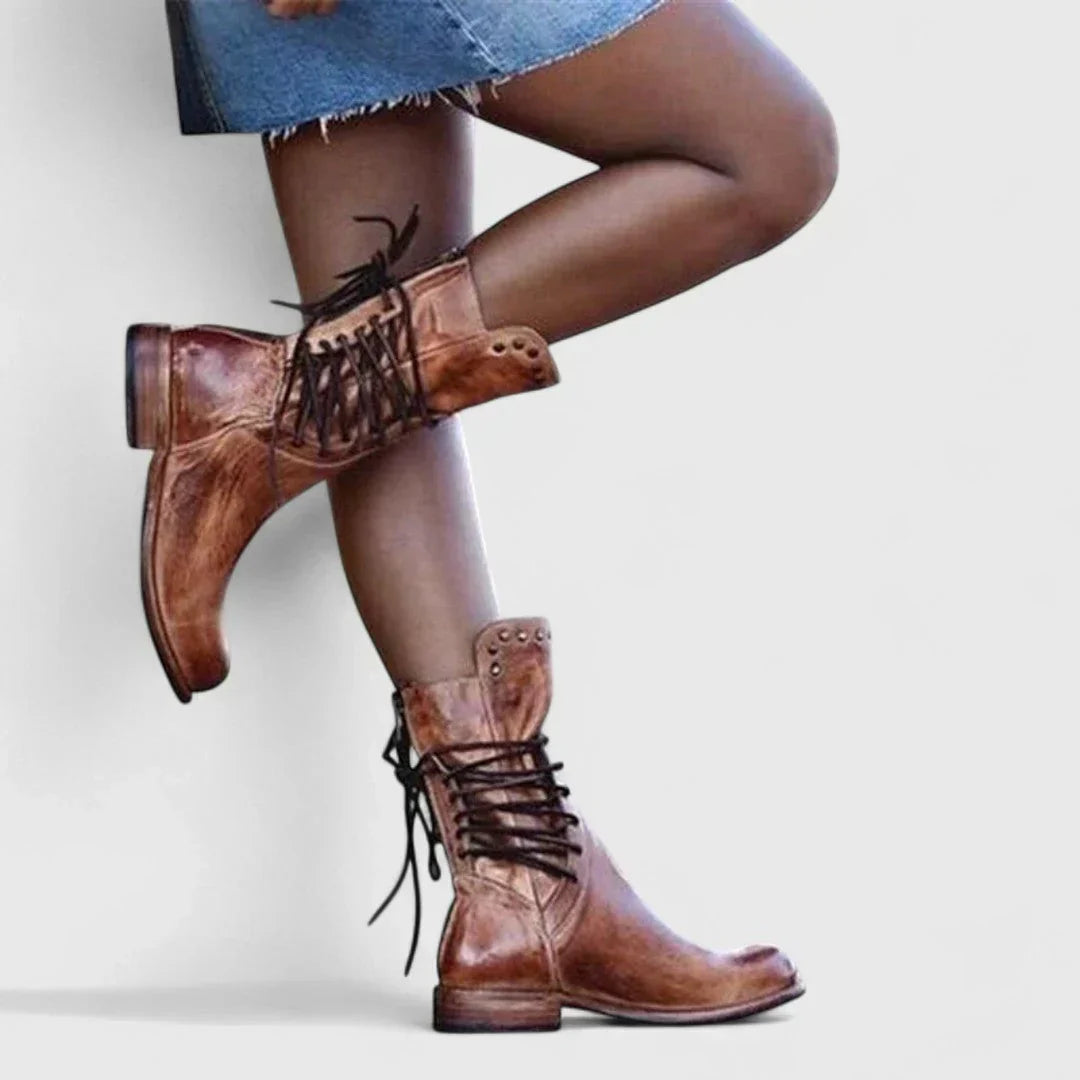 Brown leather lace-up ankle boots with studded strap and low block heel