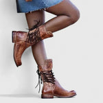Brown leather lace-up ankle boots with studded strap and low block heel