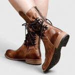 Brown leather lace-up ankle boots with rugged sole and stacked block heel