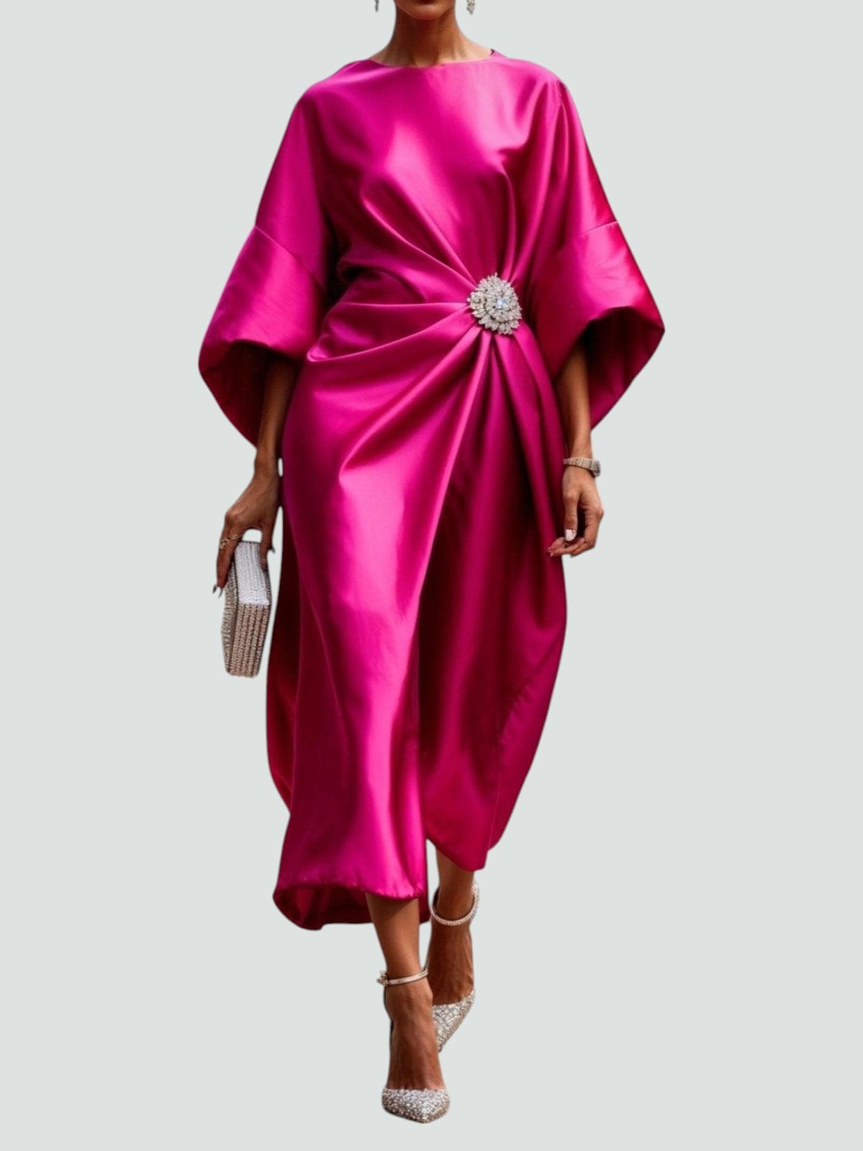 Fuchsia satin long evening dress with draped batwing sleeves and jeweled waist brooch.