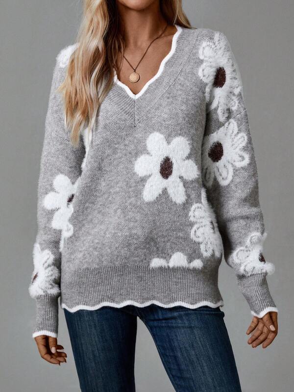 Gray floral V-neck sweater with white and dark-centered flower designs