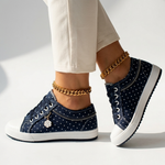 Navy floral-pattern low-top lace-up sport sneakers with white rubber toe