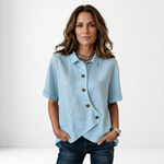 Light blue asymmetric button-up blouse, short sleeves, point collar, curved hem detail