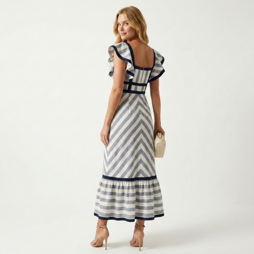 Backless blue-and-white striped maxi dress with cap sleeves and ruffle hem