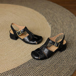 Black natural leather sandals with buckle straps and low block heel