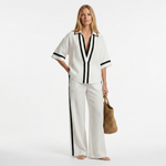 White graphic trim set: V-neck short-sleeve shirt and wide-leg pants