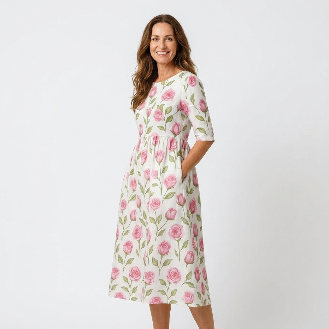 Casual midi dress in white with pink rose print, half sleeves, gathered waist