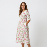 Casual midi dress in white with pink rose print, half sleeves, gathered waist