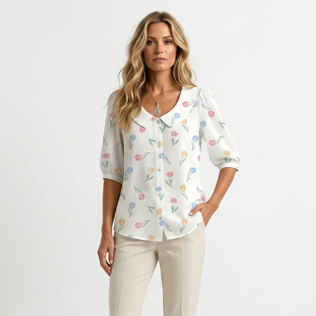 White floral button-front blouse with pointed collar and 3/4 sleeves