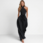 Women's black halter jumpsuit with crossed neckline, gathered waist, wide-leg pants