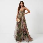 Green-toned floral maxi dress with V neckline, spaghetti straps, ruched waist, flowing skirt