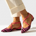 Pink-strap strappy flat sandals with pink-and-black zebra print pointed toe