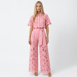 Pink lace two-piece set with cropped short-sleeve jacket and wide-leg pants