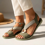Flat slide sandals in green with wide buckle ring and elastic strap