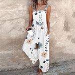 Loose printed overalls, sleeveless white with blue and brown floral print, wide legs