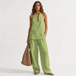 Two-piece V-neck linen set with sleeveless top and wide-leg pants in lime green.