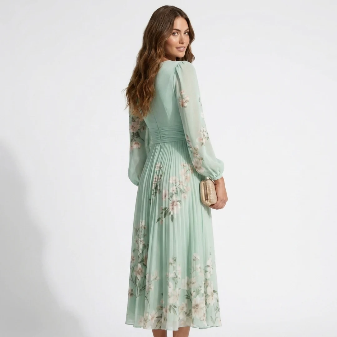 Mint green floral midi dress with V-neck and long sheer sleeves, gathered at waist