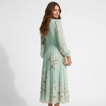 Mint green floral midi dress with V-neck and long sheer sleeves, gathered at waist