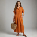 Orange cotton shirt dress, short sleeves, button front, gathered waist, midi length.