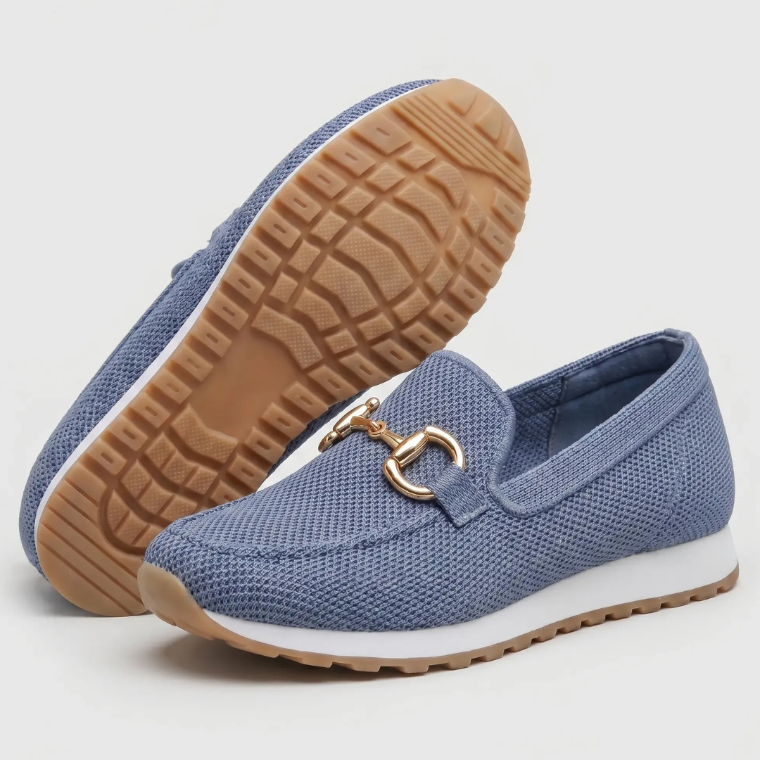 Blue orthopedic moccasin shoes, outsole and side view with gold-tone horsebit