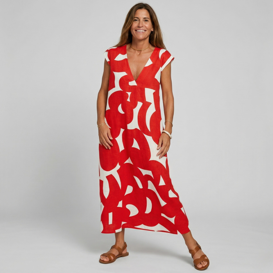 Red and white abstract print midi dress with V-neck and short sleeves