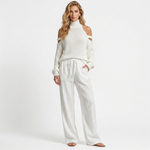 Two-piece cold-shoulder knit top and wide-leg drawstring pants in white