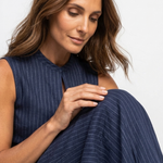 Carmen sleeveless pinstripe jumpsuit close-up of low neckline and striped fabric