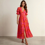Pink and orange maxi dress with deep V-neck and puff sleeves, front slit detail