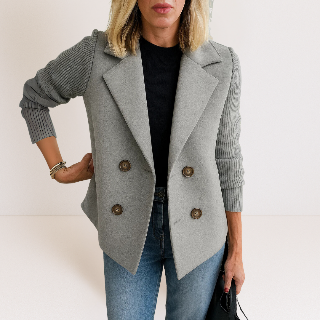 Light gray casual blazer with notch lapels, ribbed sleeves, and button front