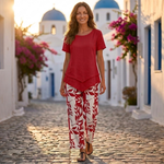 Red short-sleeve blouse with layered hem and matching leaf-pattern pants