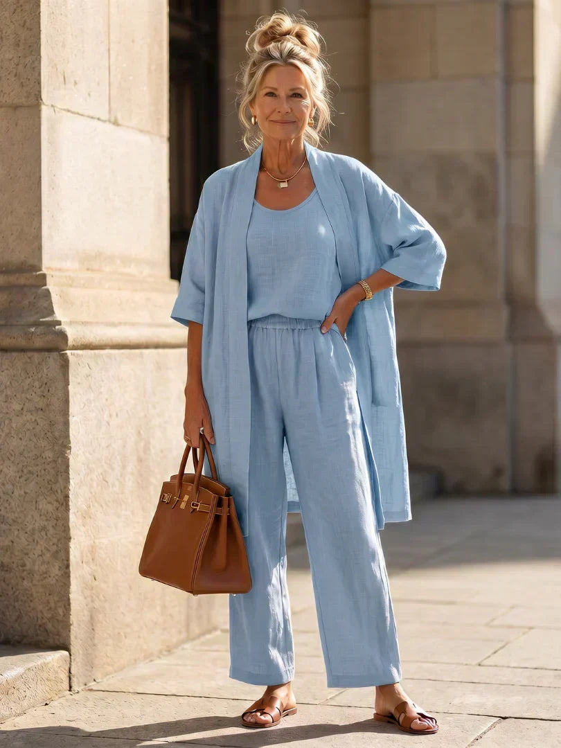 Light blue lingerie set with scoop-neck top, wide-leg pants and short robe