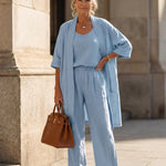Light blue lingerie set with scoop-neck top, wide-leg pants and short robe
