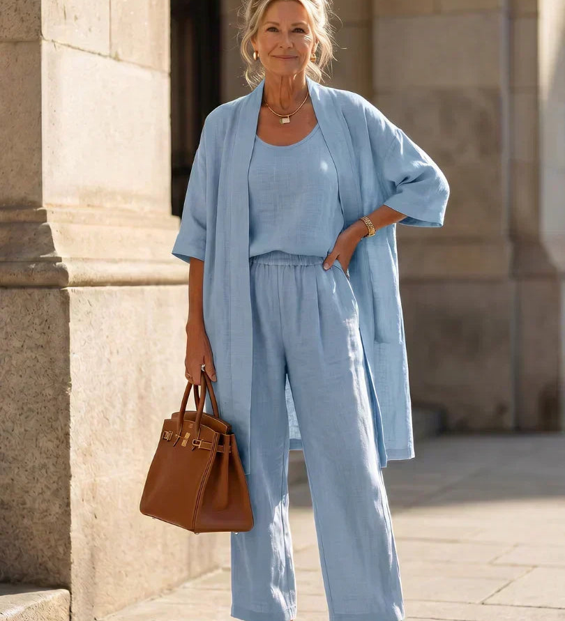 Light blue lingerie set with scoop-neck top, wide-leg pants and short robe