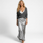 Madalina knit V-neck sweater over silver-gray satin maxi dress, front view