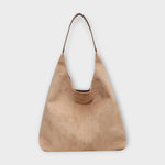 Suede hobo-style handbag, light beige with top handle and curved opening